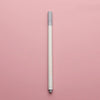 A silver transparent wax sealing bead pen standing vertically on a pink background.