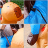 A person is shown interacting with an orange inflatable capybara costume, including a close-up of the suit and a hand holding