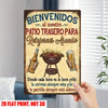Vintage tin sign with Spanish text welcoming guests to a backyard patio for relaxing and grilling