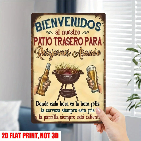 Vintage tin sign with Spanish text welcoming guests to a backyard patio for relaxing and grilling