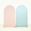 Two fabric arch backdrop covers in soft pink and light blue.