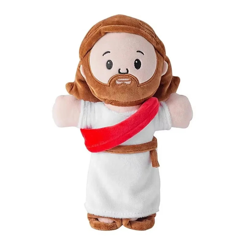A plush figurine of Jesus with a beard and brown hair, wearing a white garment and a red sash.