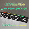 A black LED alarm clock displaying 22:08, featuring a rhythm light bar and 3-level brightness adjustment.