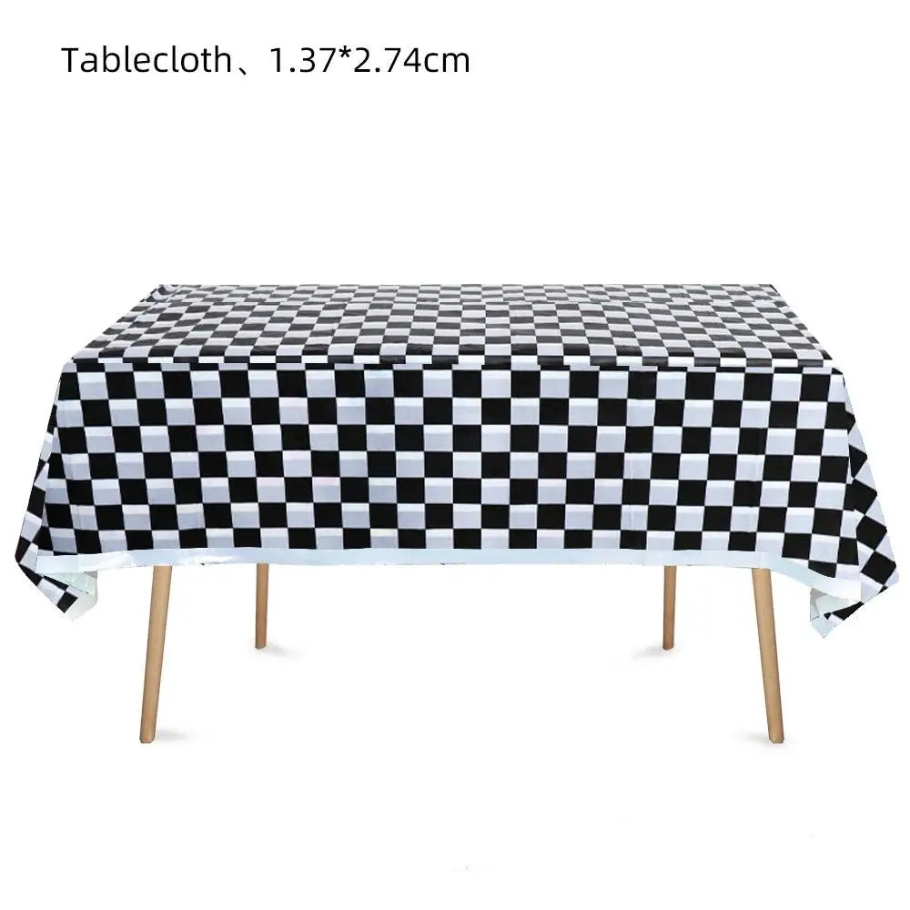 Black and white checkered tablecloth measuring 1.37 by 2.74 cm