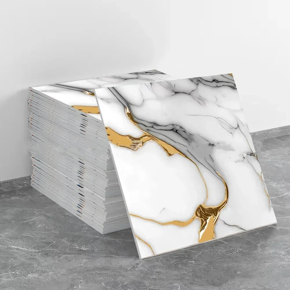 Stack of gold marble peel-and-stick wall panels featuring white and gold veining