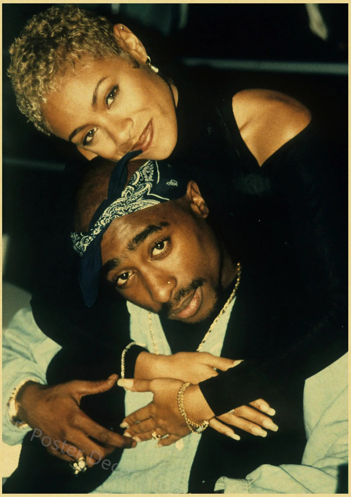 A portrait of Tupac Shakur and his girlfriend, taken in a close-up shot.