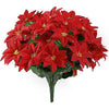 A bouquet of artificial red poinsettia flowers with yellow centers for holiday decoration.