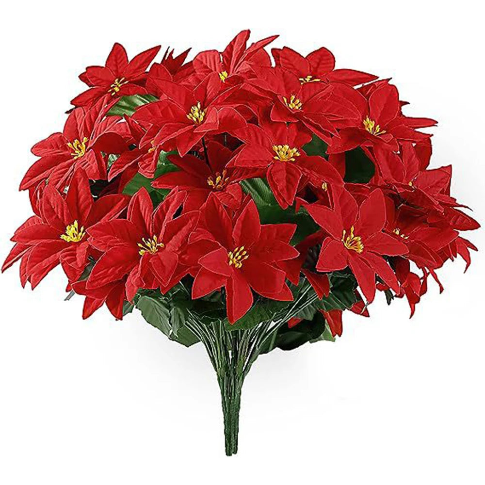 A bouquet of artificial red poinsettia flowers with yellow centers for holiday decoration.