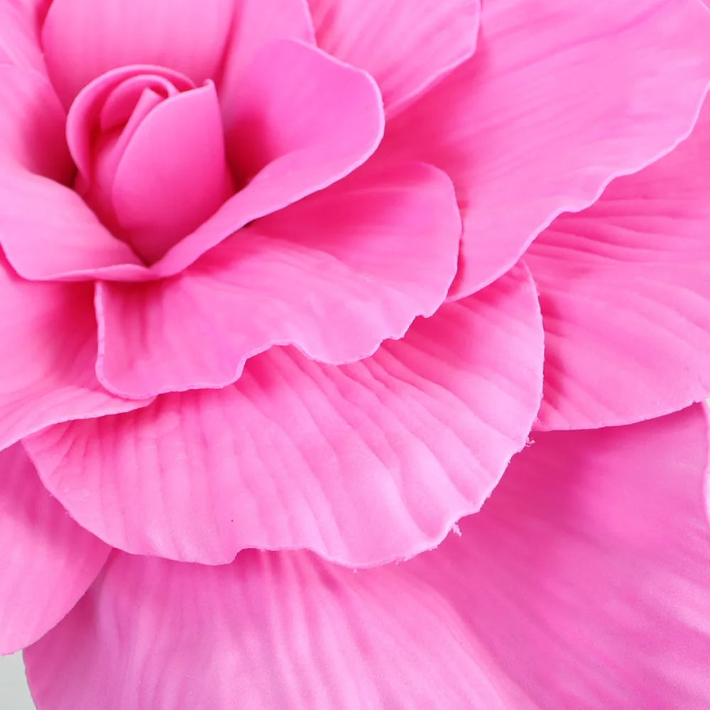 Close-up of vibrant pink PE foam rose flowers used for wedding and party decoration