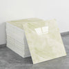A stack of ten self-adhesive marble tile stickers in a pale yellow and white marbled pattern.