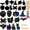A set of 12 black Halloween themed scratch art cards featuring various spooky icons like pumpkins bats and cats.