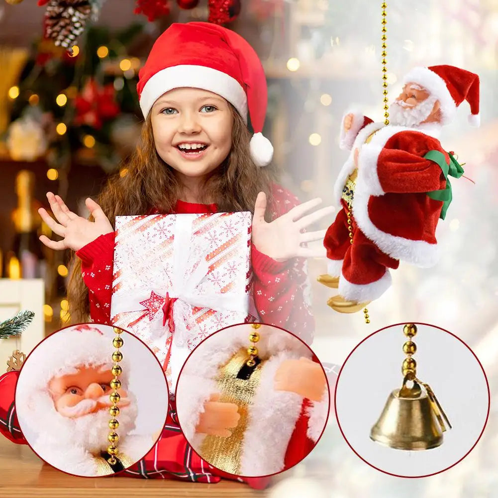 A smiling child wearing a Santa hat holds a gift wrapped in festive paper next to a hanging Santa decoration.