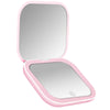 A pink portable folding makeup mirror with an LED light, shown open.