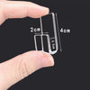 A hand holds a clear acrylic vinyl record display rack with dimensions marked.
