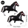 A pair of black foil horse number balloons, one standing and one lying down.