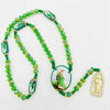 Green crystal rosary necklace featuring Saint Jude and Virgin Mary cross pendants
