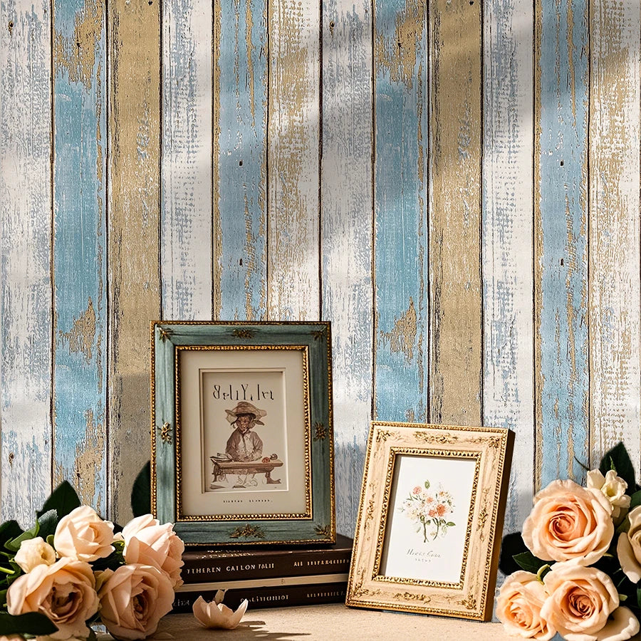 Vintage blue and white plank wallpaper featuring distressed wood texture on a wall.
