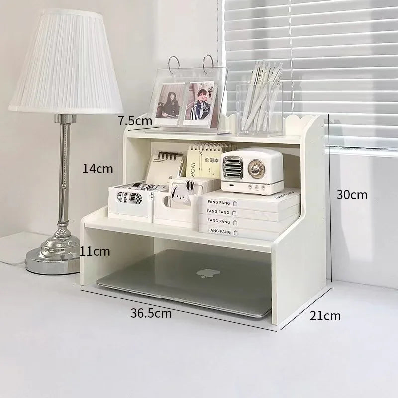 A white two-layer desktop organizer shelf featuring compartments for stationery and small electronics.