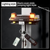 A black cover style jumping light style product featuring a classic car headlight design with illuminated orange lights.