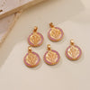 A set of four gold-toned religious pendants featuring St. Benedict Medals with intricate designs and purple enamel.