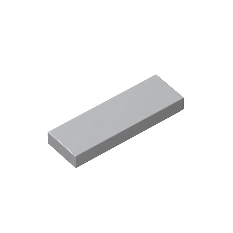 A rectangular smooth building brick tile in a light gray color.