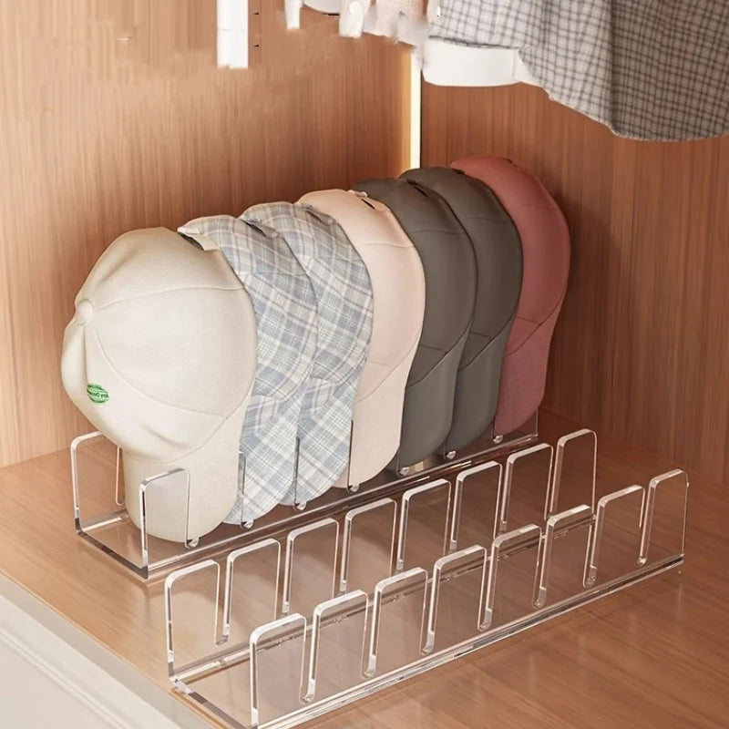 Acrylic hat storage rack displaying various colored hats on a wooden shelf.