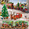 A set of Christmas advent calendar building blocks featuring Santa, a tree, and train models.