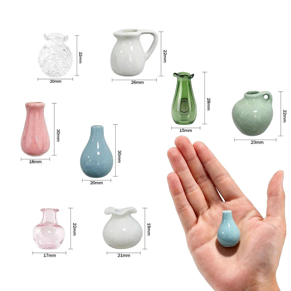A collection of small ceramic plant vases in various shades of pink, green, and blue, shown next to a hand.