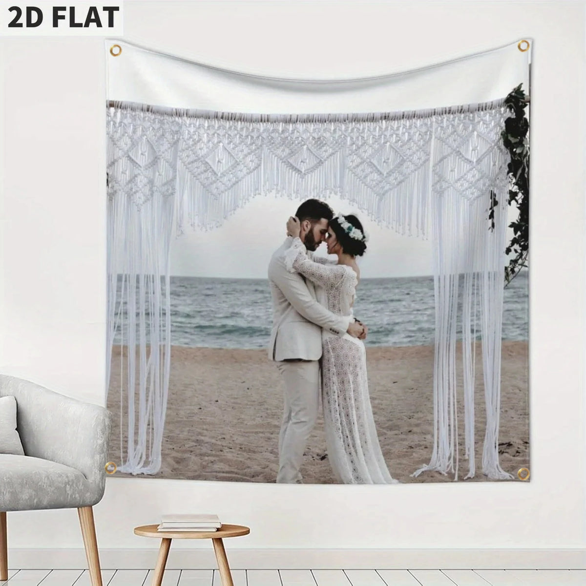 A white fabric banner featuring a photo of a couple embracing, decorated with sheer white fringe and draped fabric.