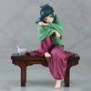 A collectible PVC figure of Maomao from The Apothecary Diaries, depicted in green and purple robes.
