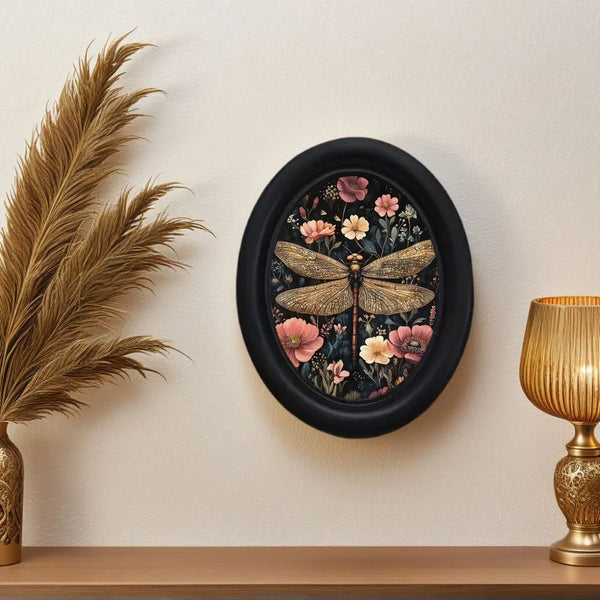 Black framed vintage floral dragonfly wall decor featuring pink and yellow flowers