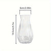 Clear plastic faceted diamond crystal vase with a narrow neck and flared base.