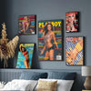 A collection of Playboy magazine posters featuring female models and various text designs displayed on a gray wall.