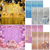A collection of metallic foil tinsel fringe backdrops featuring various colors like gold, blue, and pink.