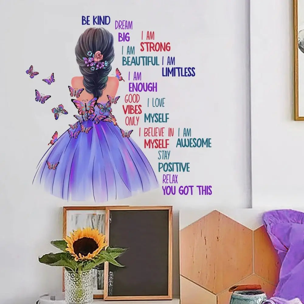 A poster featuring inspirational words like Be Kind Dream Big and a butterfly design.