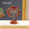 A Red Jasper crystal tree featuring various reddish-brown natural stones mounted on a base.