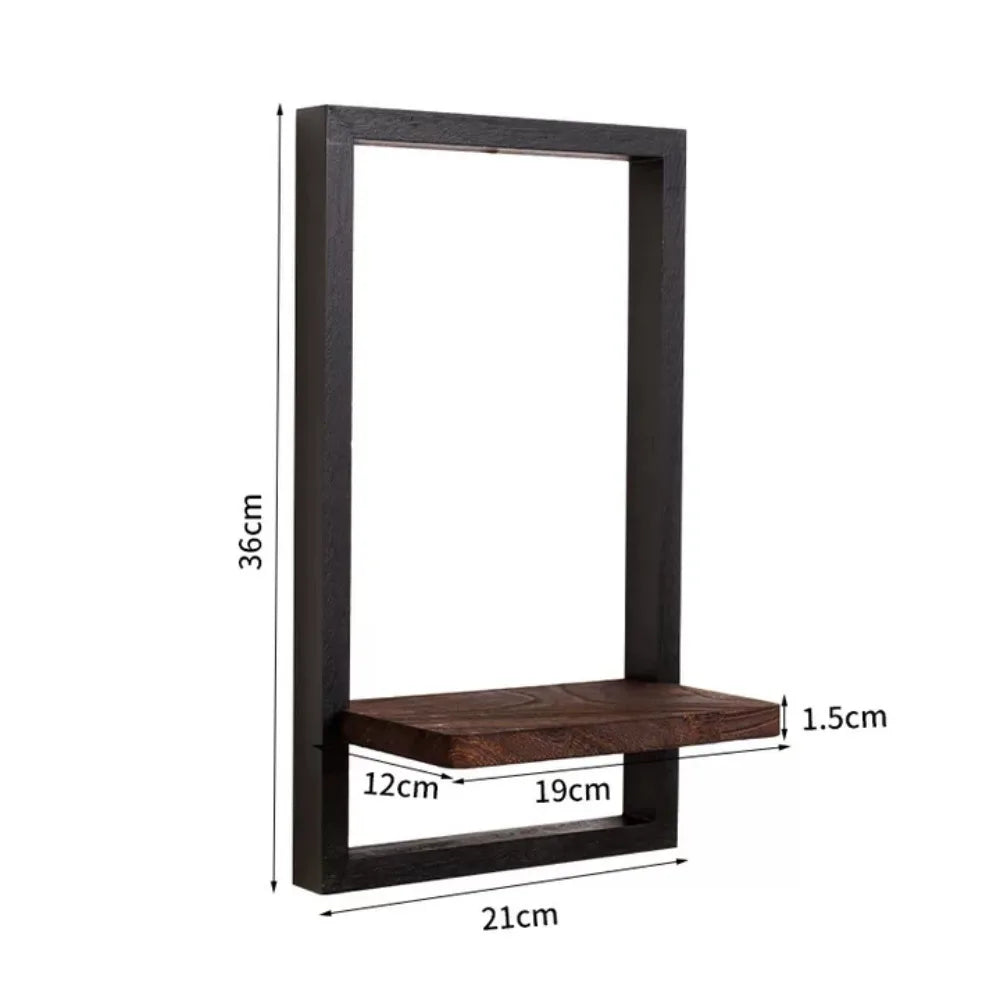 A black wooden floating wall shelf with a rectangular frame and a wooden shelf insert.