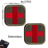 Two embroidered red cross tactical morale patches with hook and loop for medical use
