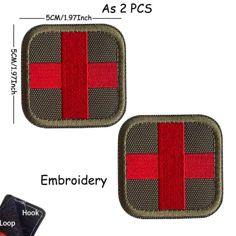 Two embroidered red cross tactical morale patches with hook and loop for medical use