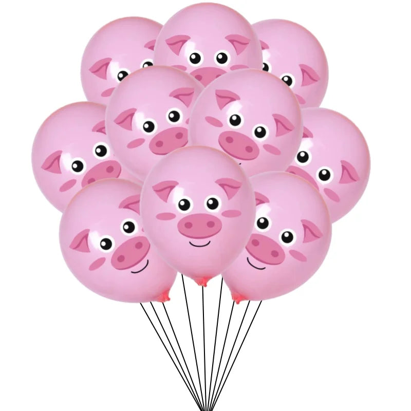 A set of pink latex balloons shaped like pigs, tied together with strings.