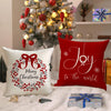 Red Christmas cushion covers featuring a bow and wreath design with Merry Christmas and Joy to the world text