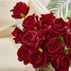A bouquet of deep red velvet artificial roses for weddings and home décor.