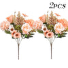 Two bouquets of artificial silk roses and daisies with dried filler flowers