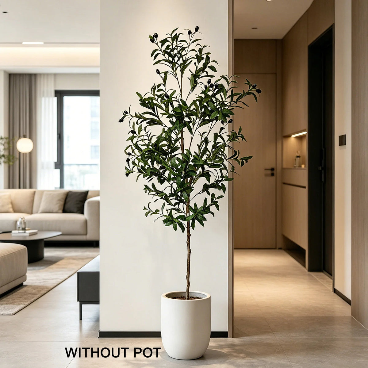 A lifelike artificial olive tree in a white pot displayed indoors against a modern wall.