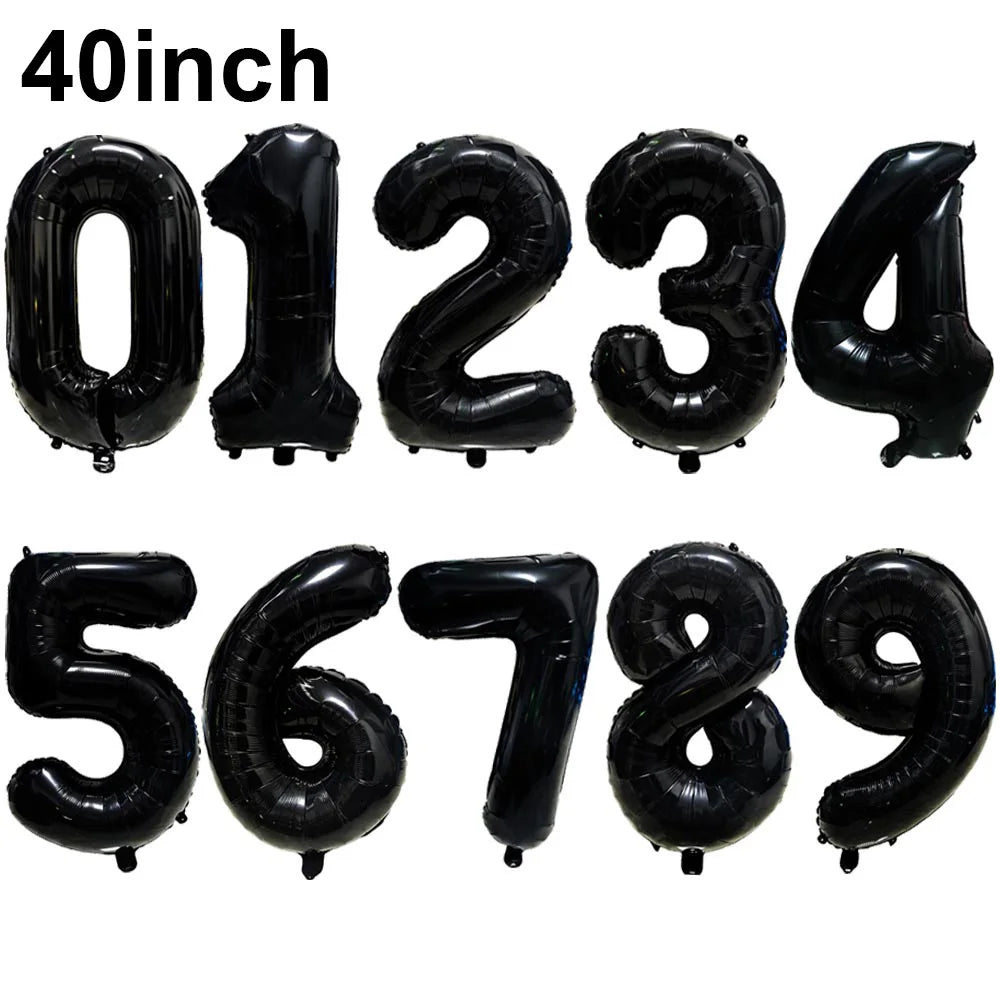 A set of black foil number balloons spelling out 0123456789, measuring 40 inches in length.
