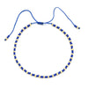 Handmade boho glass bead bracelet with adjustable cord in blue and gold beads