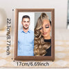 A wooden photo frame displaying a portrait of a man and a woman, showing the frame dimensions.