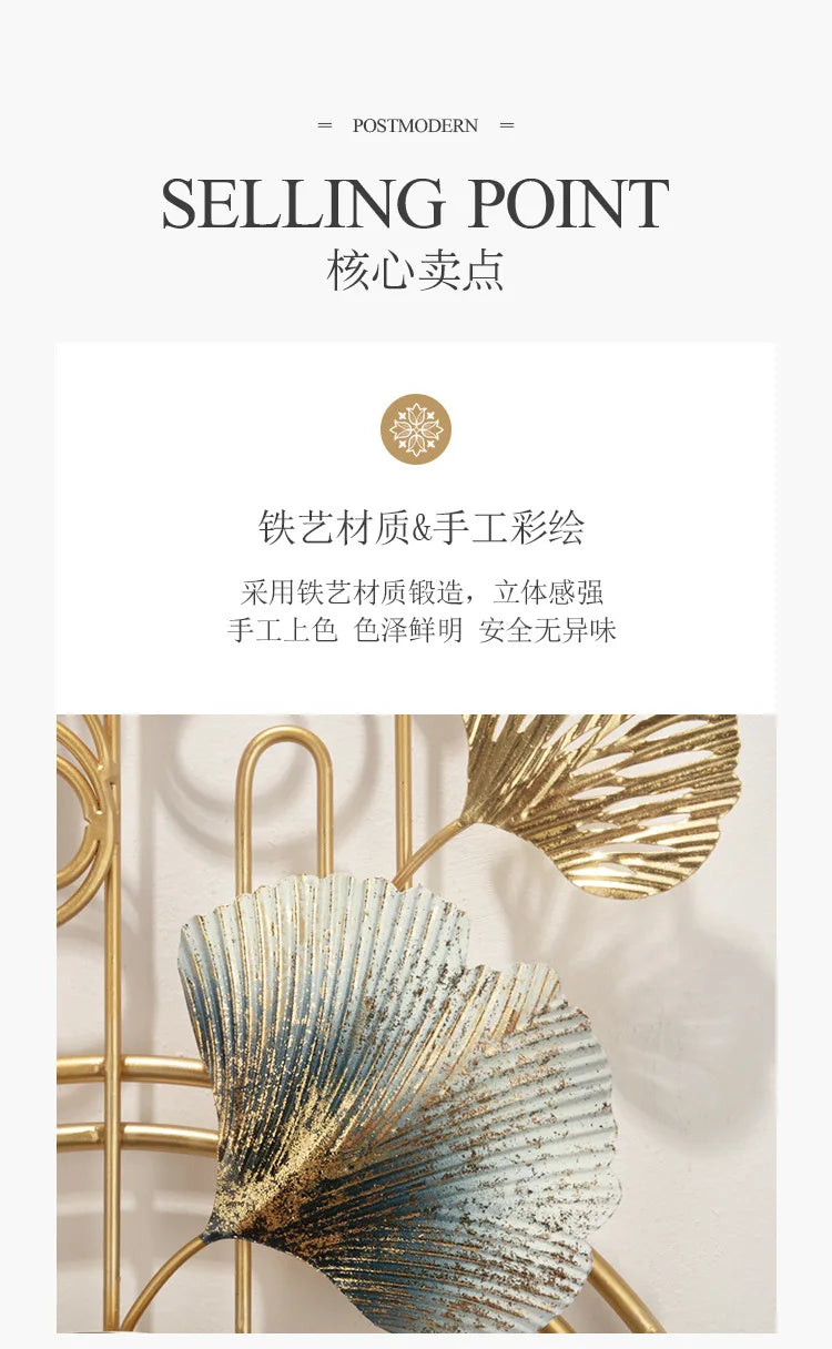 A close-up of a textured, metallic blue and gold ginkgo leaf decorative piece used as an artistic element.