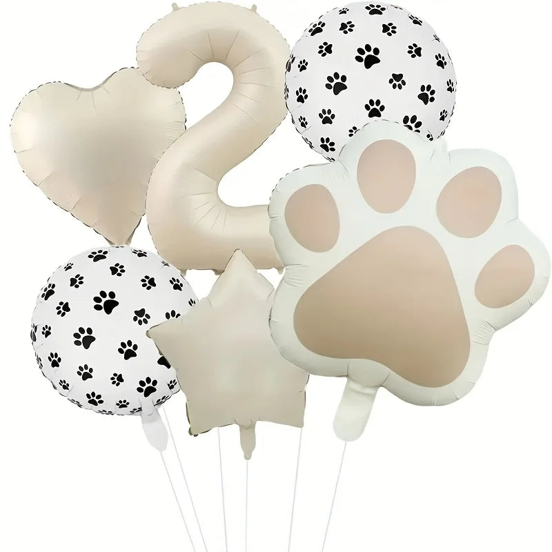 A set of six foil balloons featuring paw prints and the number two in beige and white.