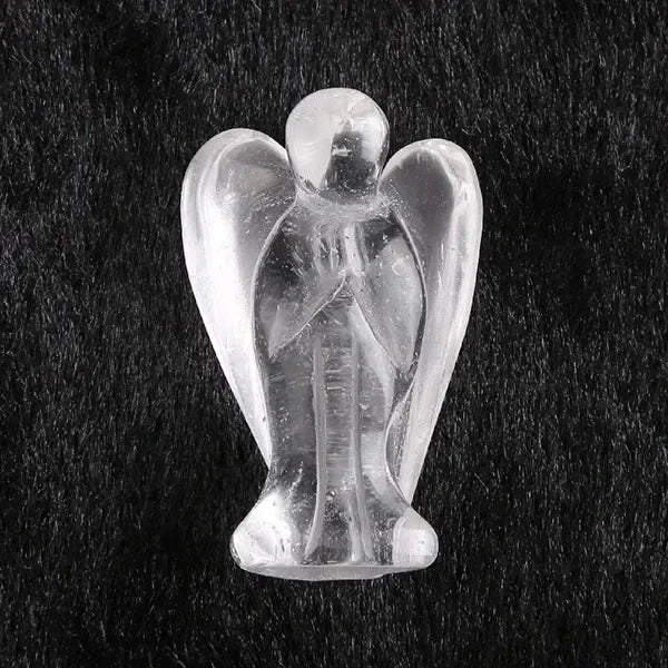 Hand-carved clear crystal figurine of an angel with wings